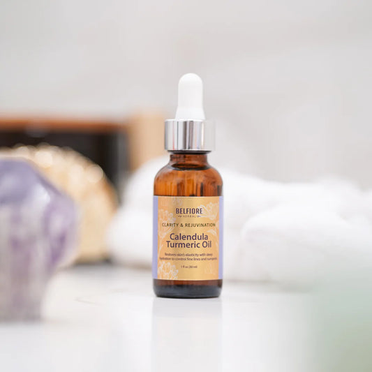 Aceite de caléndula y cúrcuma (para manchas oscuras)